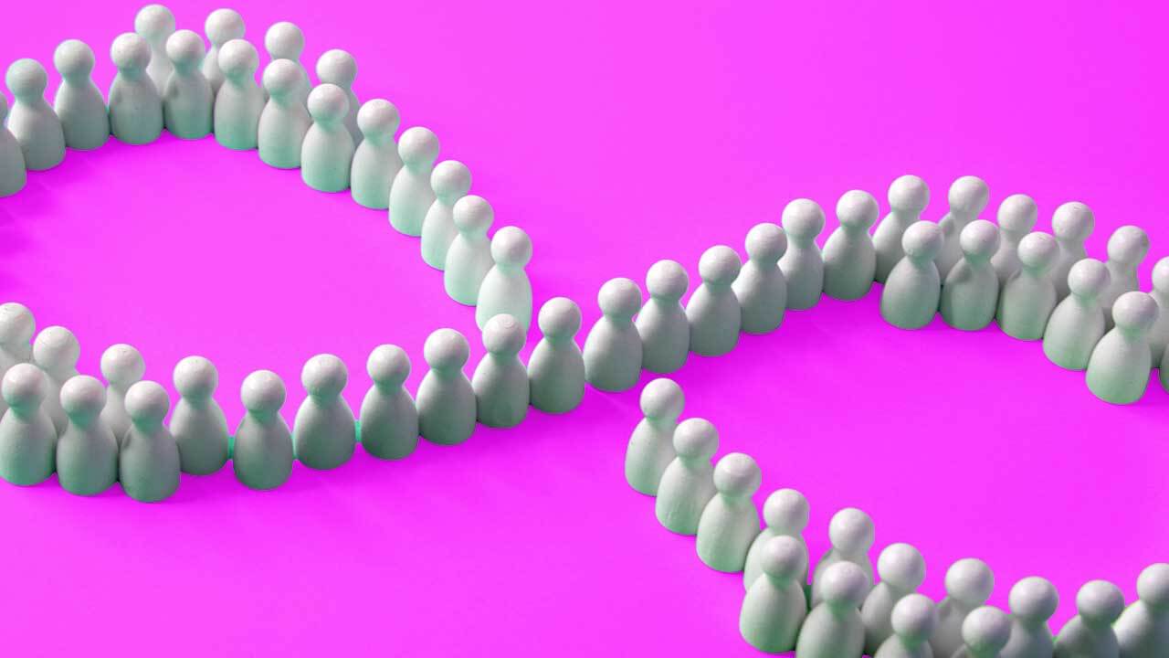 A crowd of white figures forming an infinity sign on a purple background, symbolizing endless collaboration, unity, and a collective community.