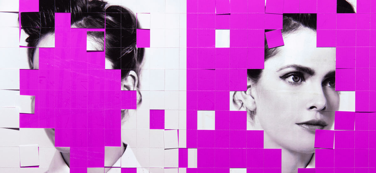 Tiled mosaic visualization of a human portrait against a purple background, illustrating the simulation of detailed human data points and the masking of identity through structured data modeling.